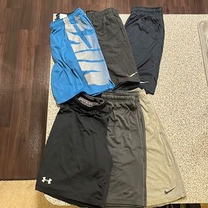 Lot of Mens medium, dri-fit, Nike running shorts and one pair of under armor